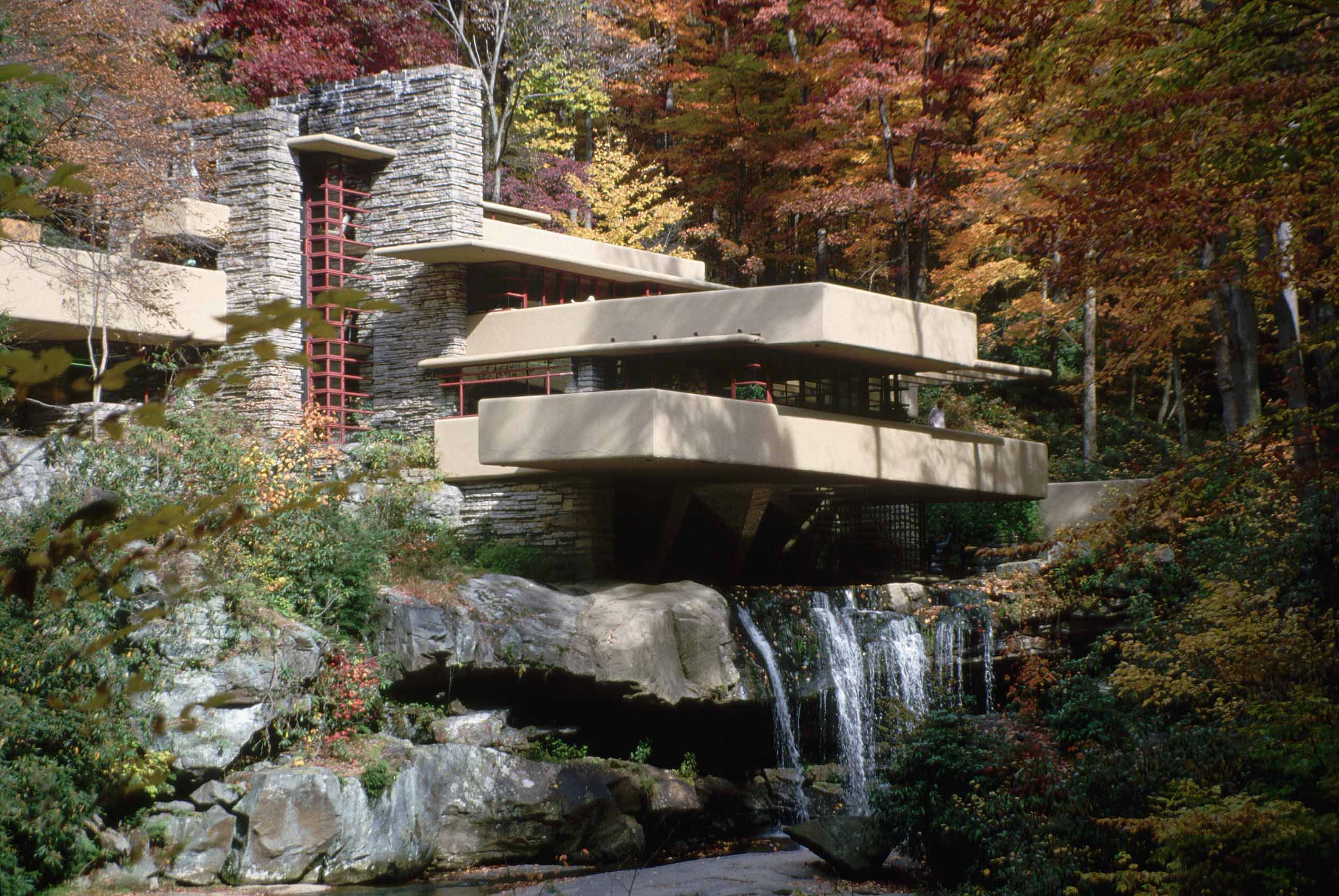 A photo shows the Frank Lloyd Wright-designed house, Fallingwater, during autumn (© Richard A. Cooke/Corbis/Getty Images)