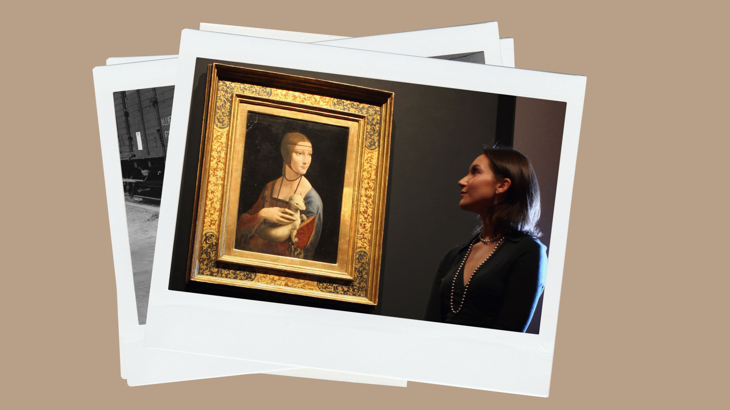 A woman admires a painting (© Dan Kitwood/Getty Images)