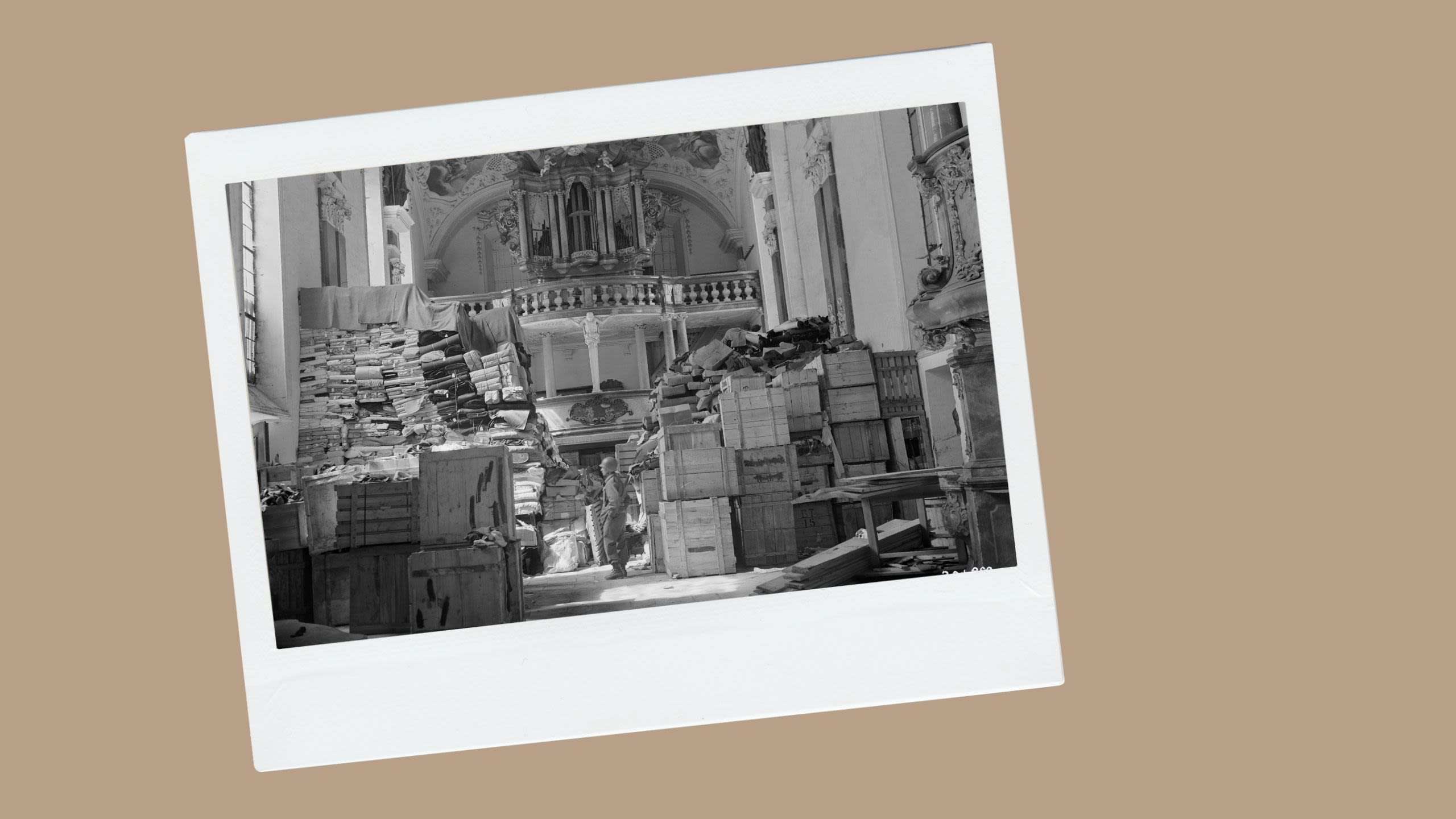 Piles of crated artwork and valuables stored inside a church (National Archives)