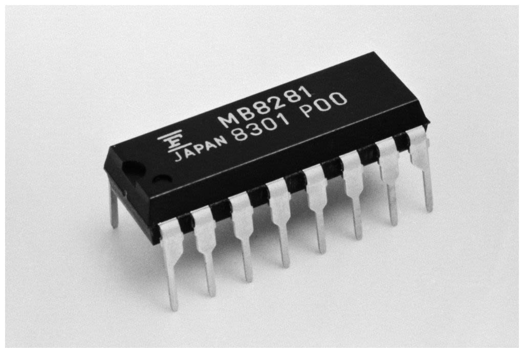 Close-up of Fujitsu 64-kilobit DRAM memory chips labeled 64K SC D-RAM, photographed in Tokyo in 1984. (© Bettmann/Getty Images)