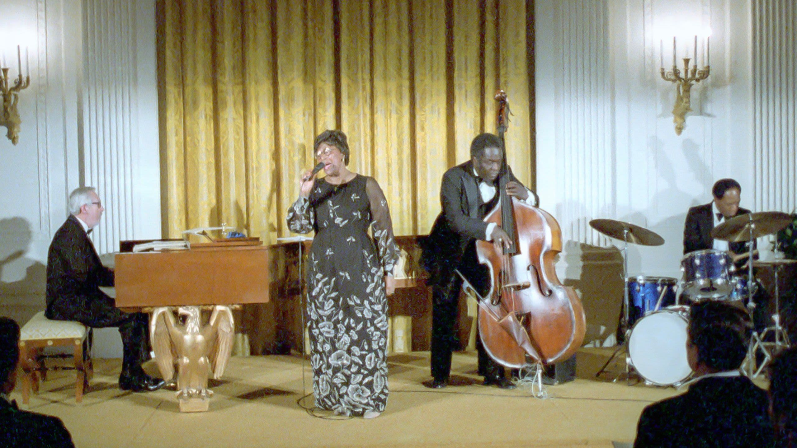 Ella Fitzgerald singing with microphone (White House Photographic Office)