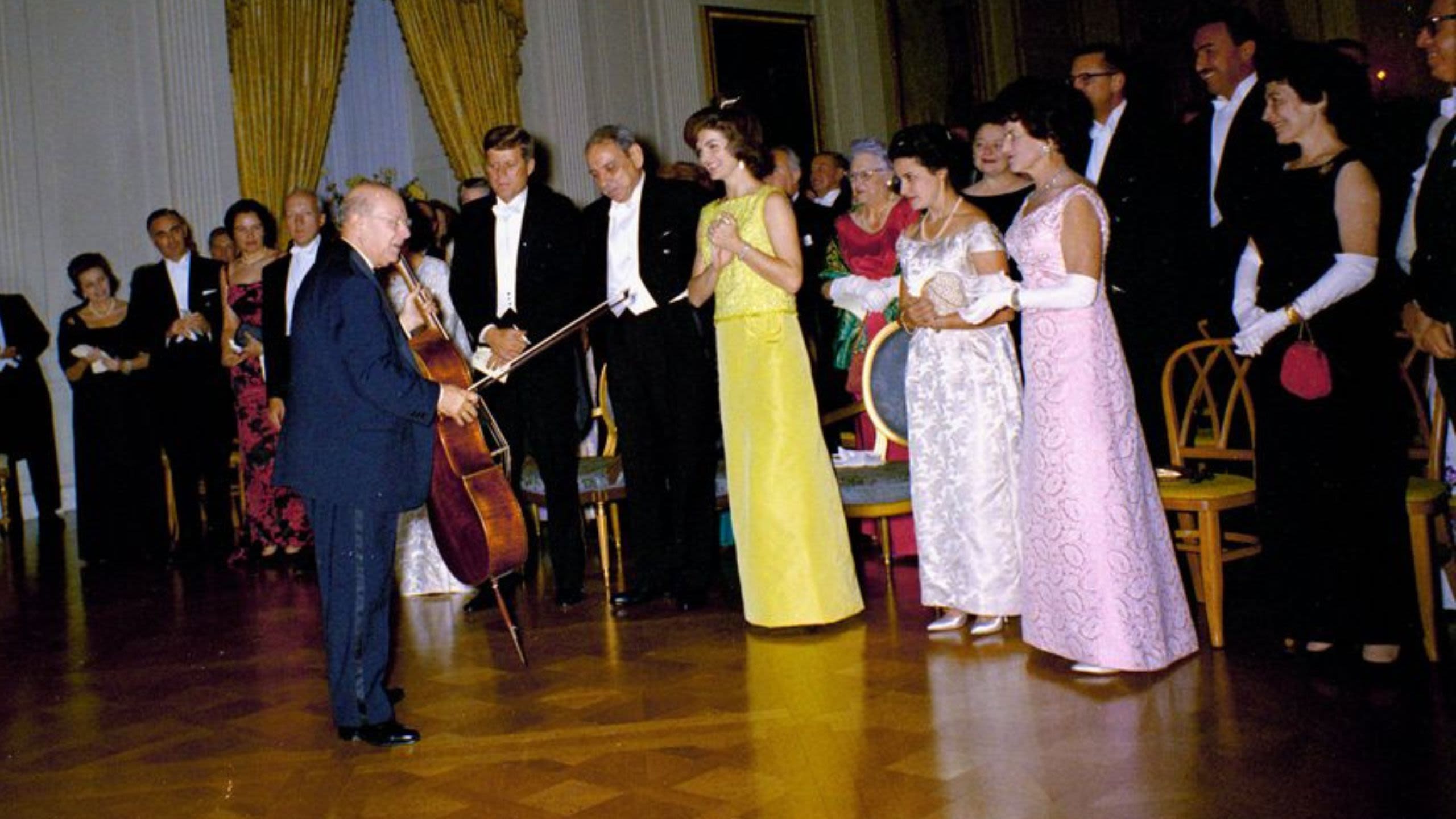Pablo Casals interacting with John F. Kennedy, Jacqueline Kennedy, attendees (White House/Robert Knudson/JFK Library and Museum)