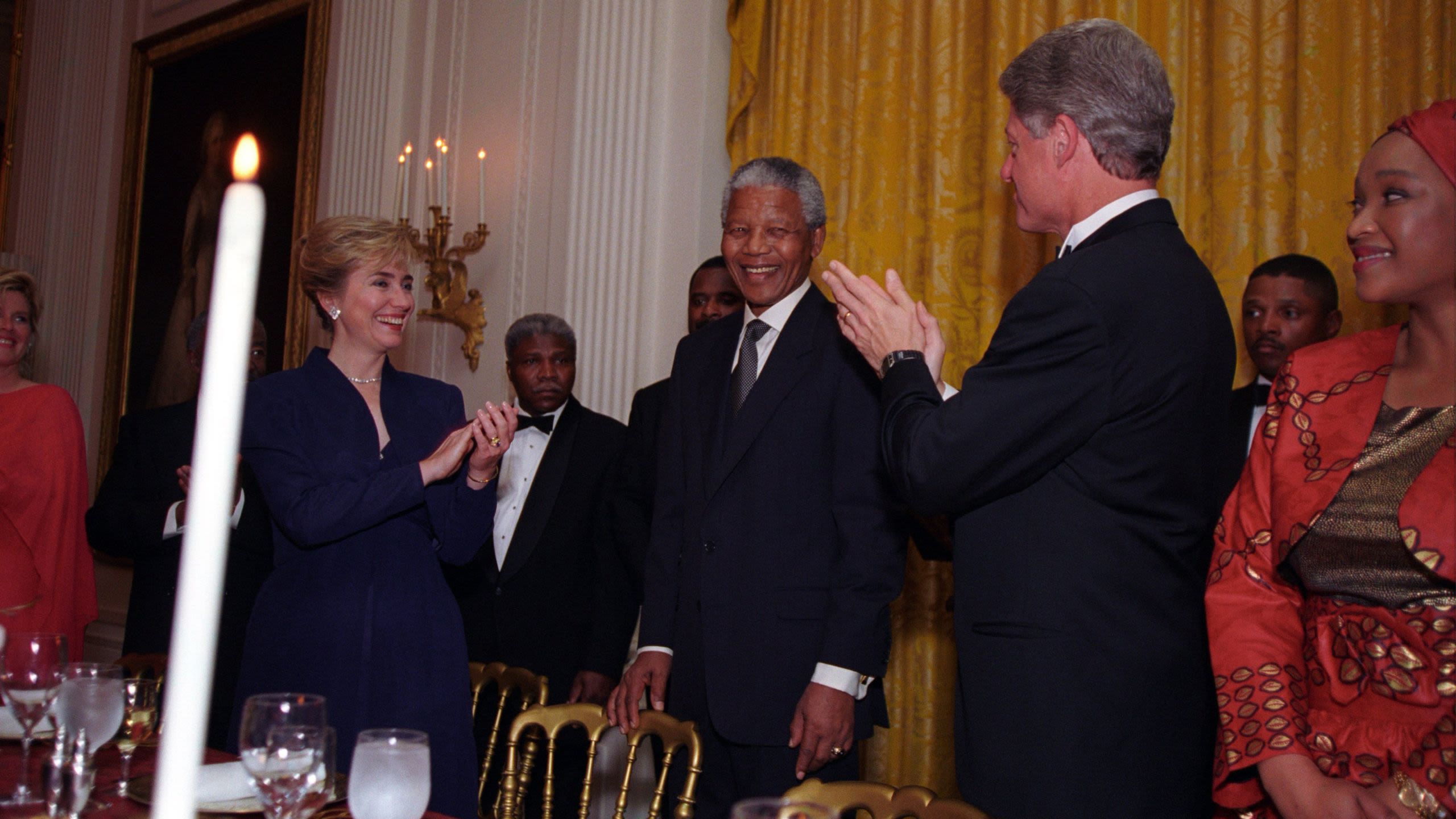 Hillary Clinton and Bill Clinton applauding Nelson Mandela (William J. Clinton Presidential Library & Museum) 
