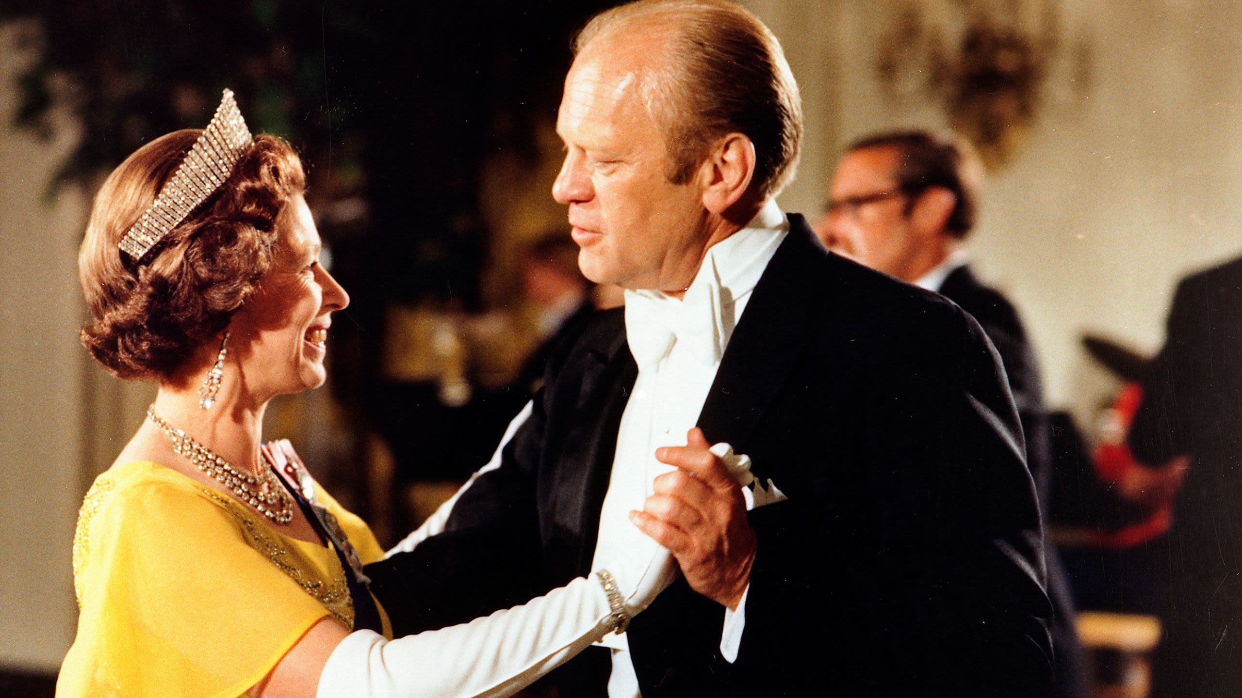 Queen Elizabeth II smiling and dancing with Gerald Ford (Gerald R. Ford Library/White House/Ricardo Thomas/AP)