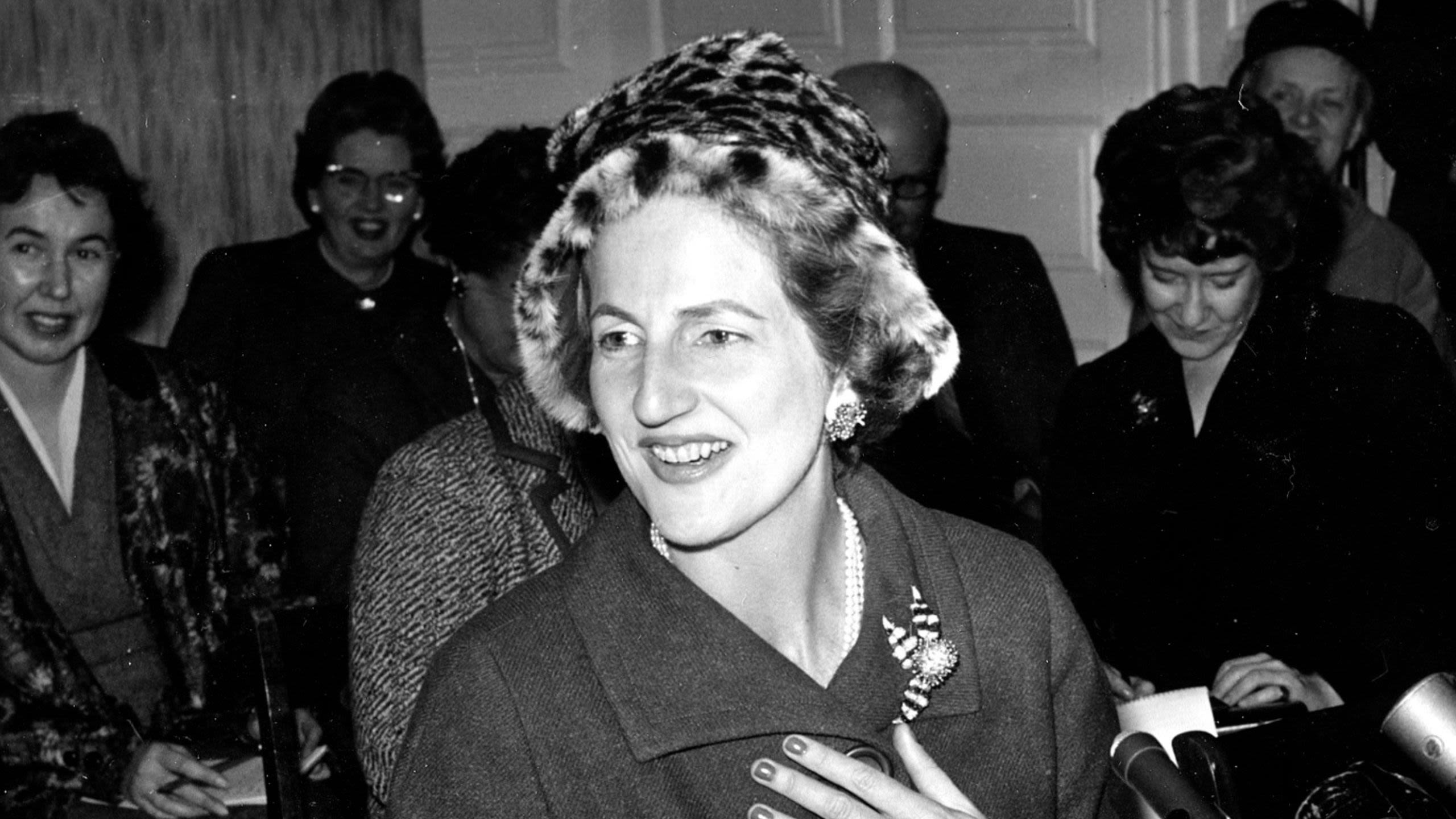 Letitia K. Baldrige speaking, with other women in background (© AP)