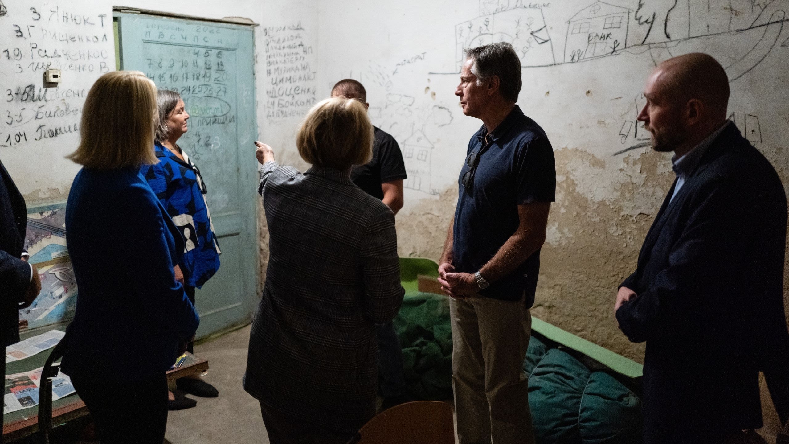 People standing in an abandoned school