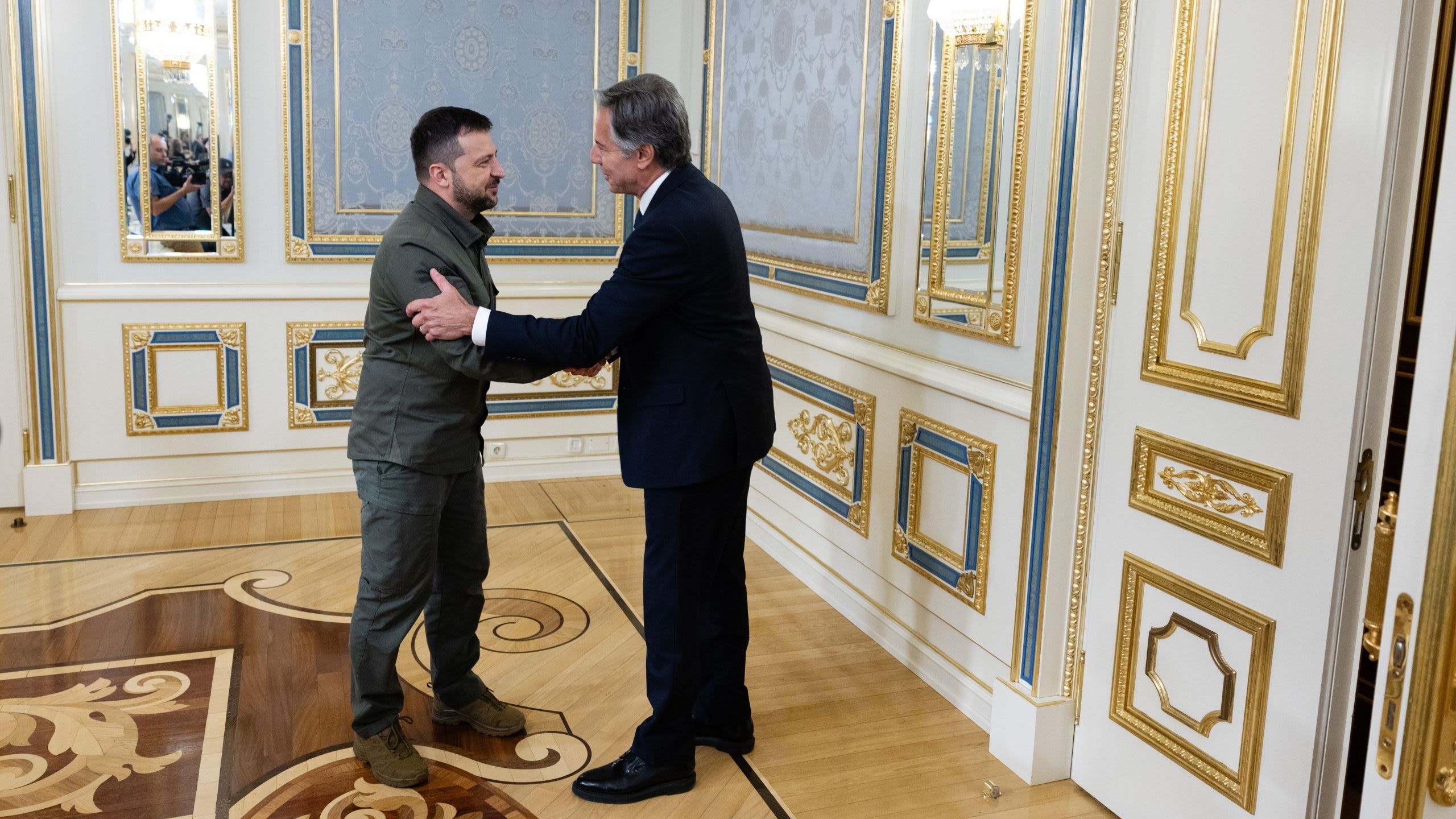 Secretary Blinken shaking hands with President Volodymyr Zelenskyy