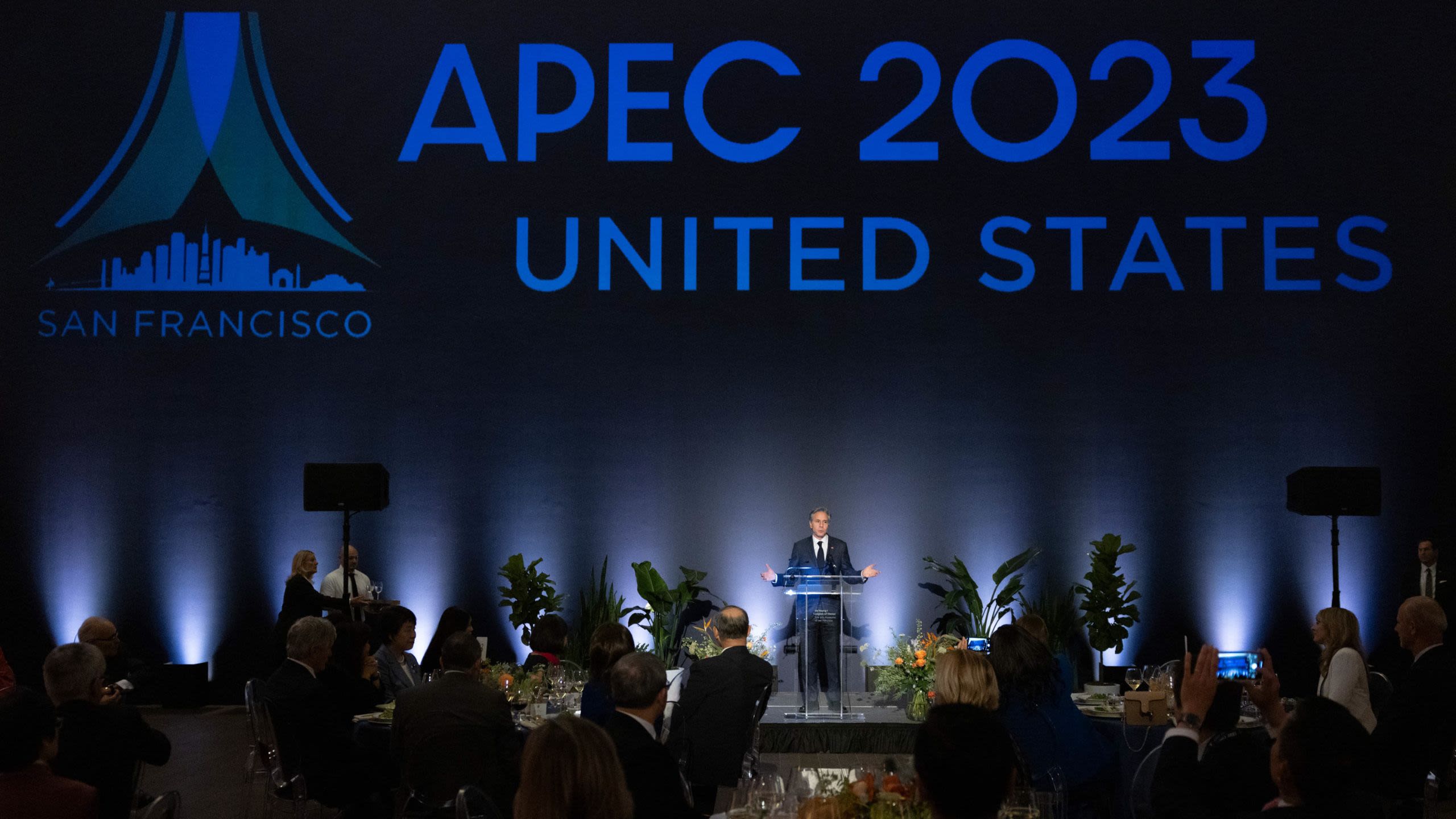 Secretary Blinken speaking at a lectern