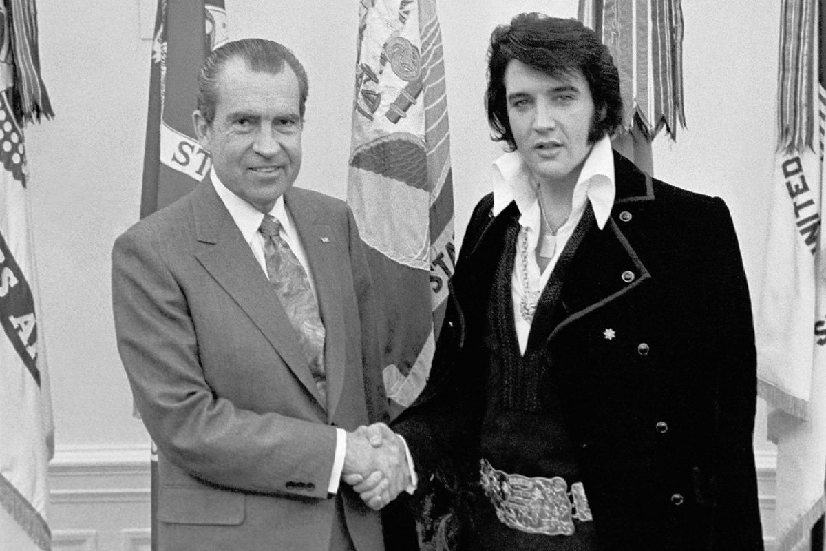 President Richard M. Nixon shaking hands with Elvis Presley at the White House (National Archives/Ollie Atkins) President Richard M. Nixon shaking hands with Elvis Presley at the White House (National Archives/Ollie Atkins)