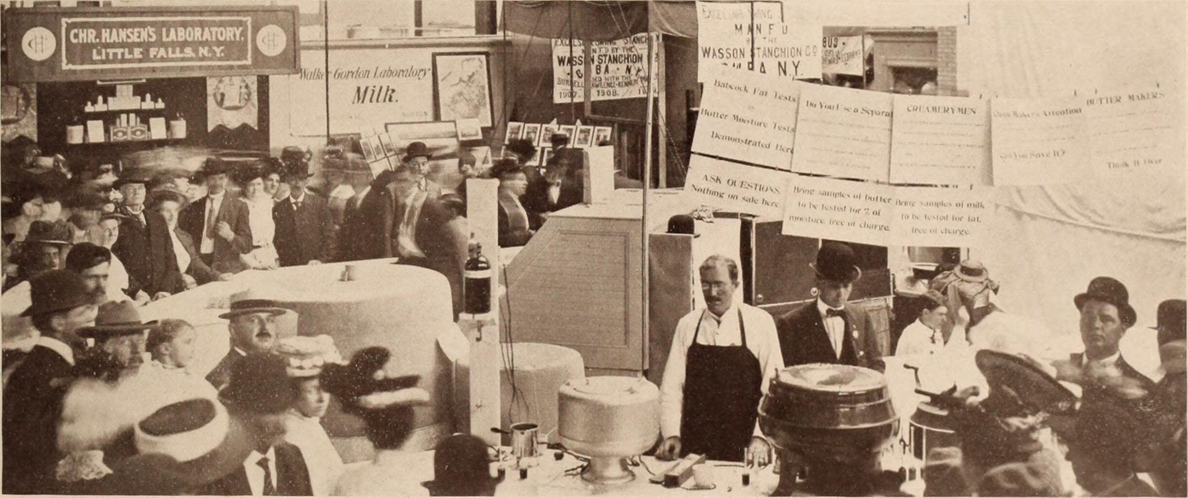 Crowds gathering at a dairy exhibit (Alamy)
