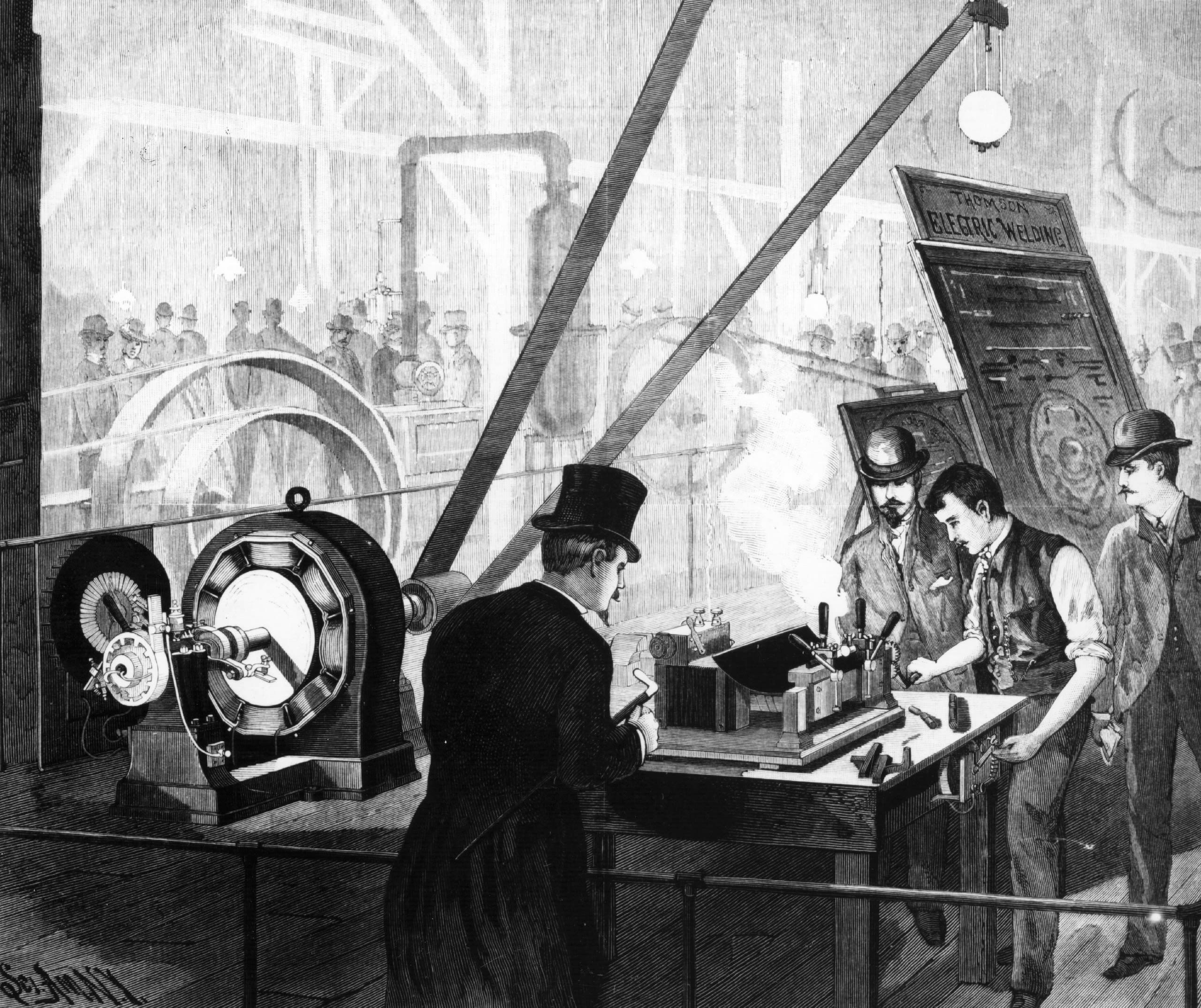 Illustration of inventor demonstrating equipment (© Hulton Archive/Getty Images)