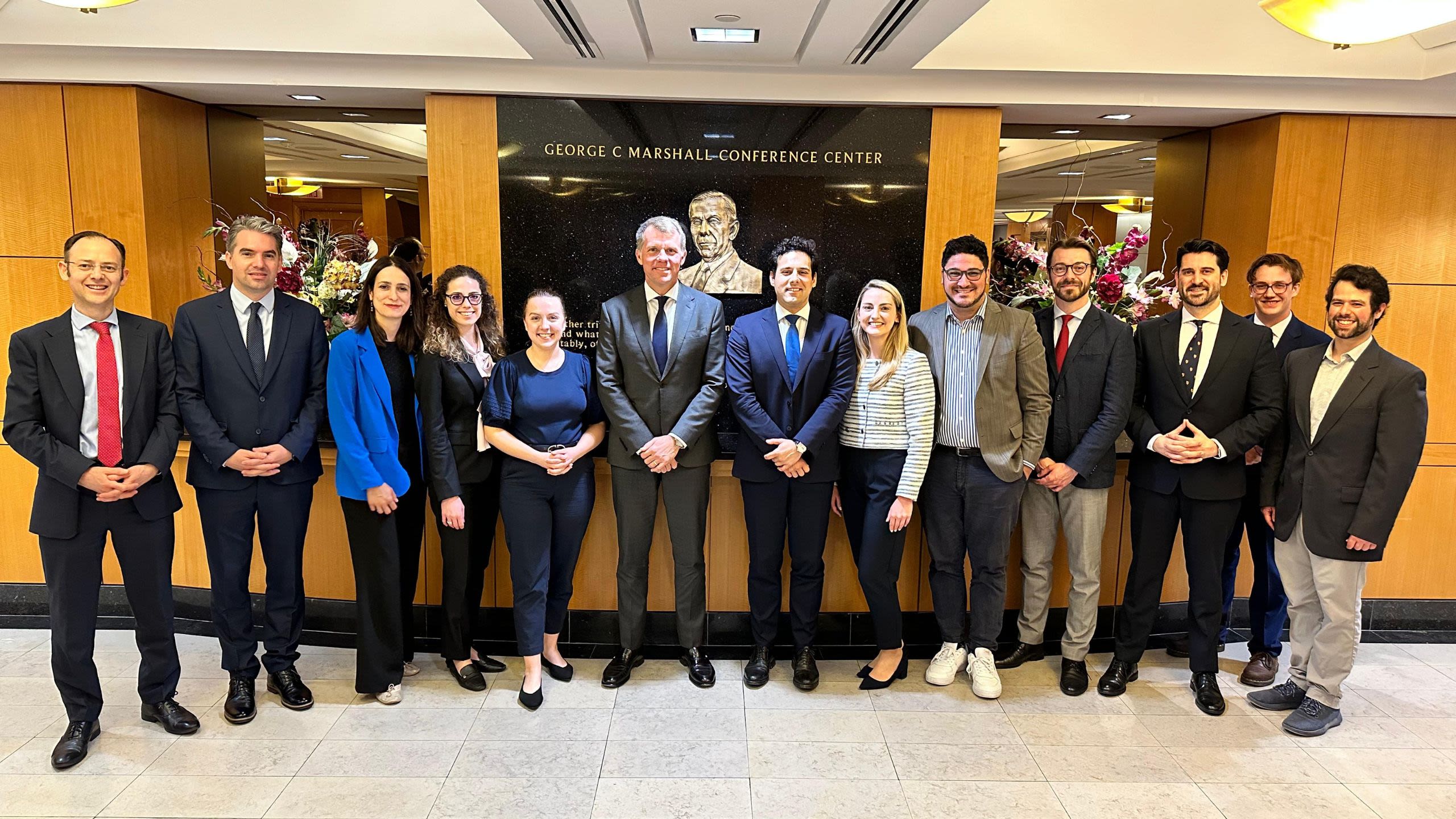 A large group of people pose for a formal photograph (Courtesy of Edith Delaney)