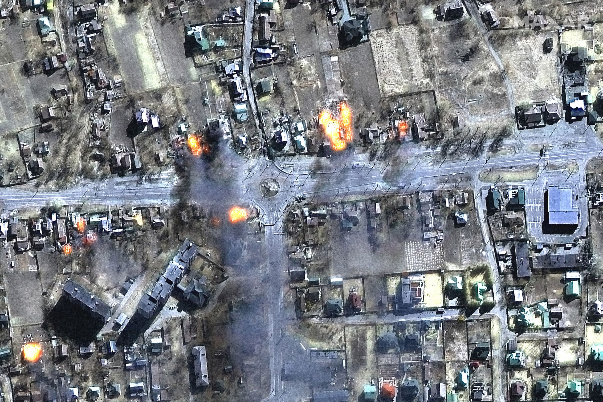 This satellite image shows burning buildings in a residential area in northeast Chernihiv, Ukraine, on March 16, 2022. (© Maxar Technologies/AP Images)
