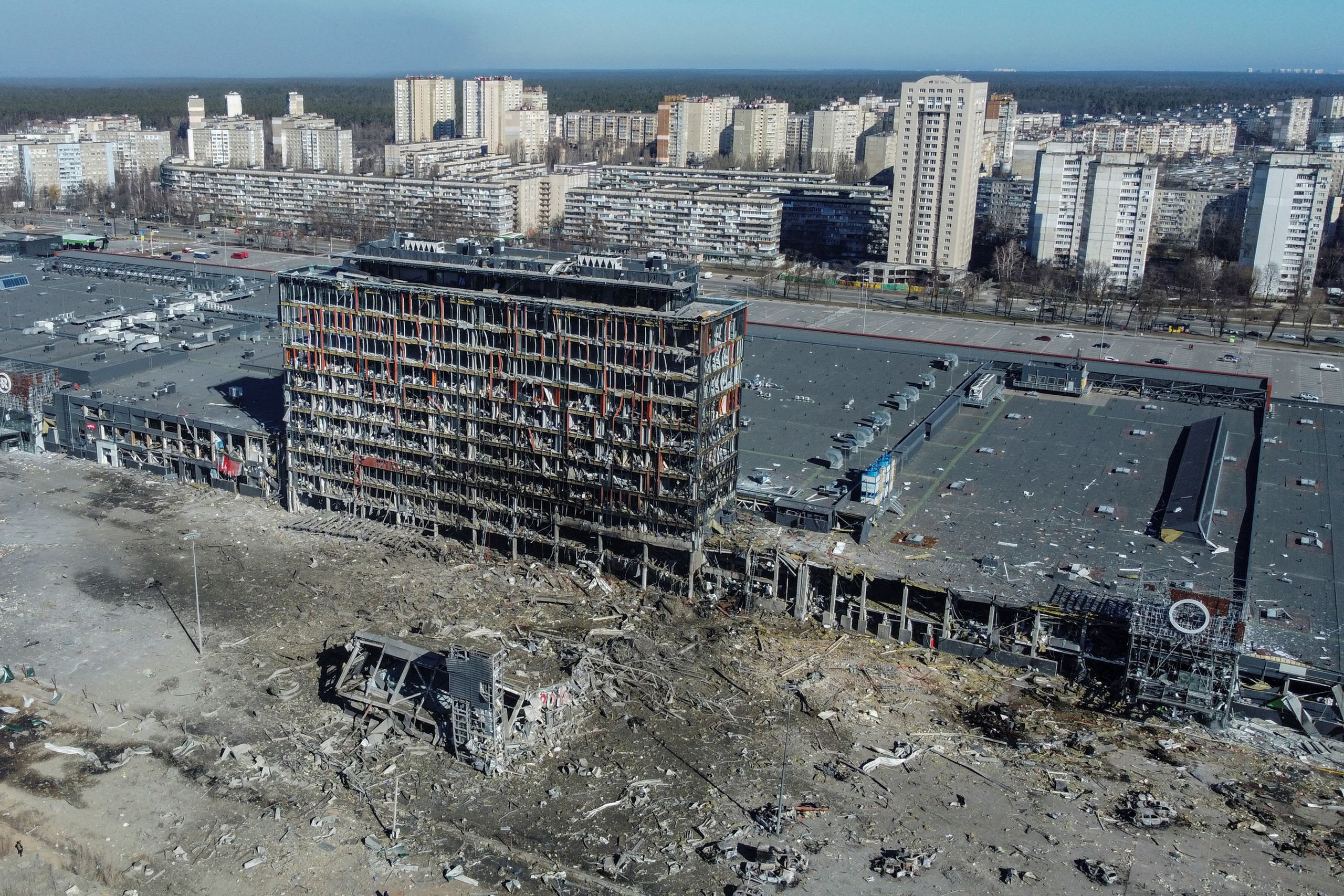 General view shows the site of a bombing at a shopping center in Kyiv, Ukraine, on March 21, 2022, as Russia's invasion of Ukraine continues. (© Marko Djurica/Reuters)